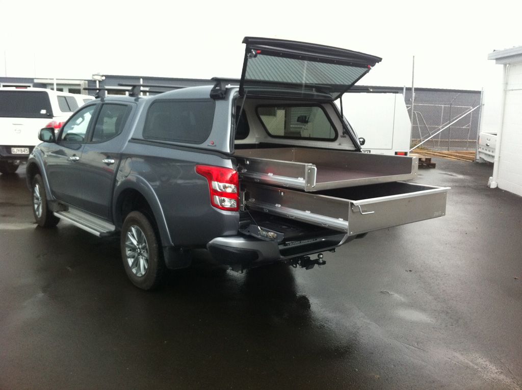 Bespoke rollout trays for easy acceess storage solutions.